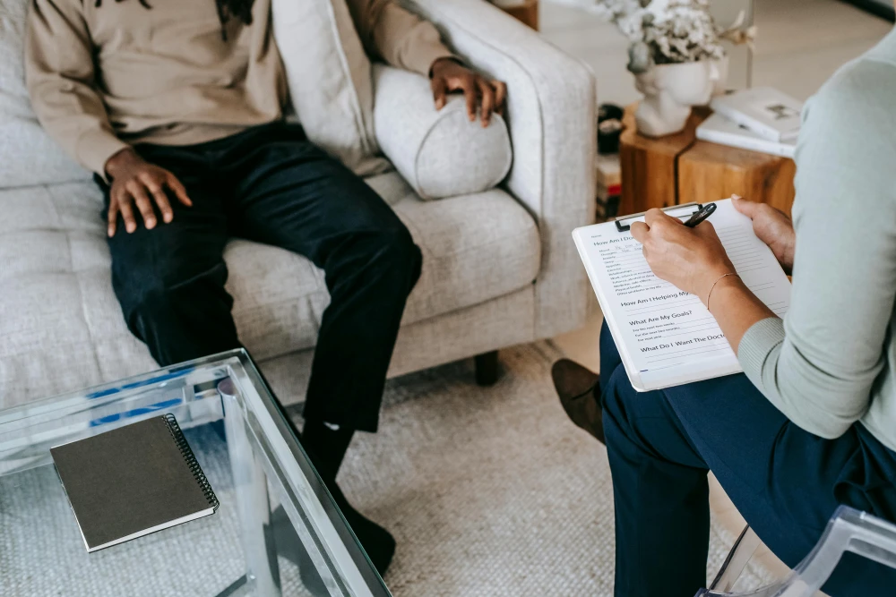 Therapist helping a patient