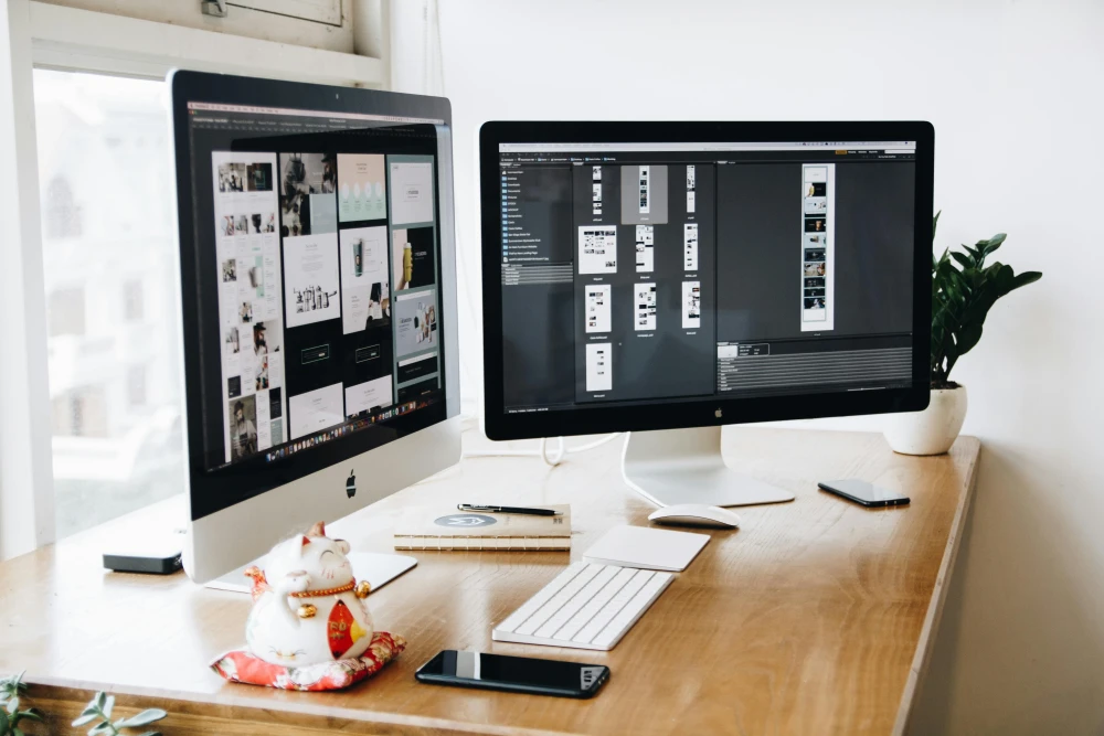 image of a website being built on a desk
